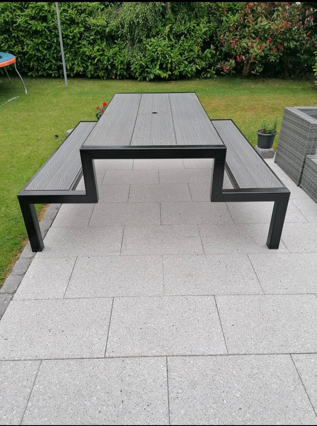 grey and black custom picnic bench by Fire Pit Stop NI